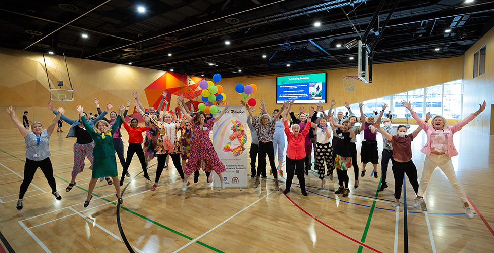 Charlie's Rainbow donors performing a group star Jump 